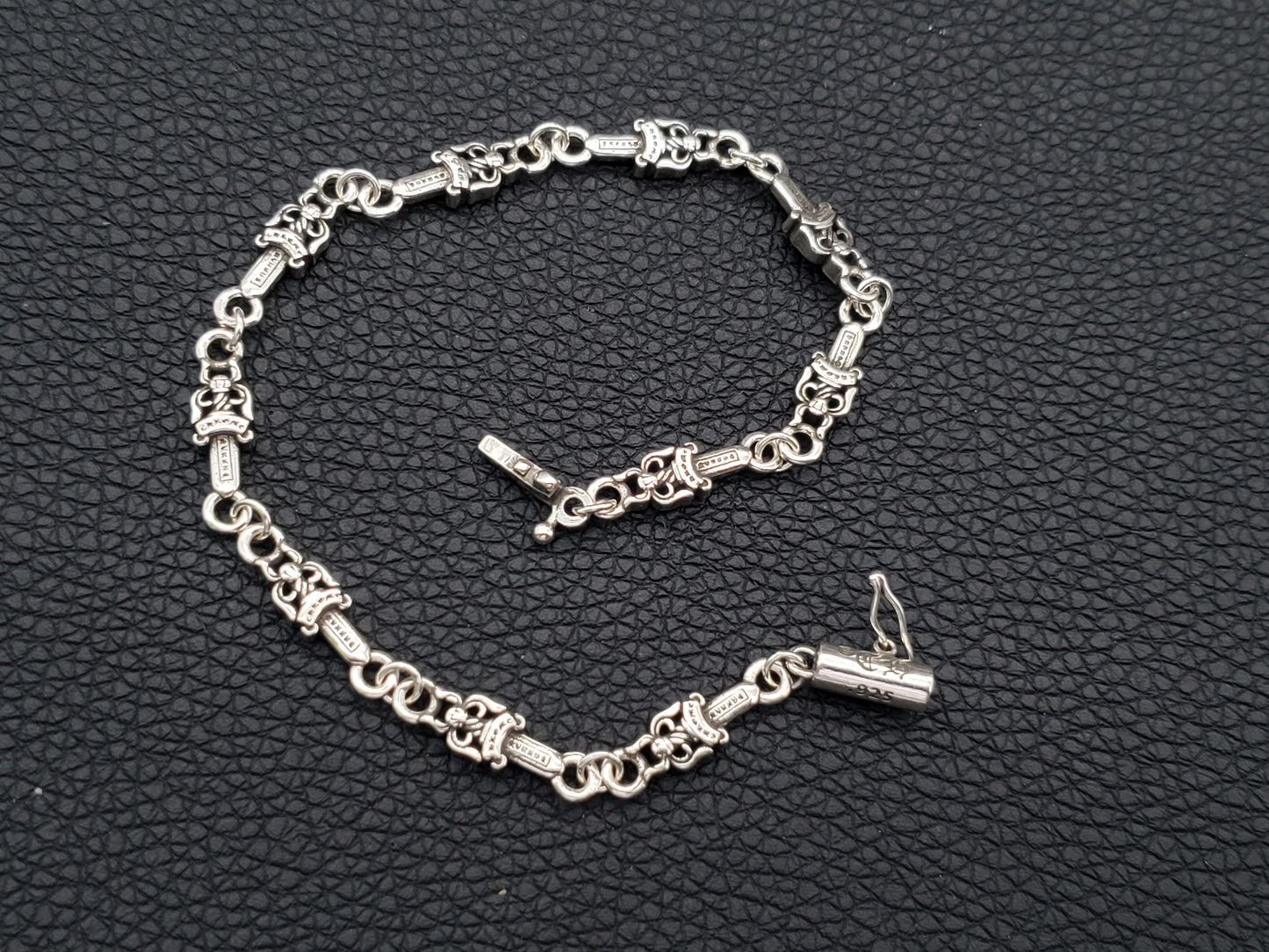 Chrome Design Star/Sword Bracelet